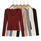 Round neck button long sleeved top