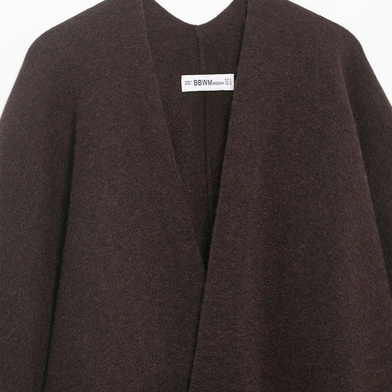 Tassel embellished knitted cloak jacket