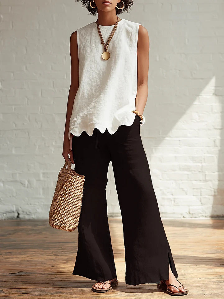 Crew-neck Sleeveless Shirt With A Wave Hem