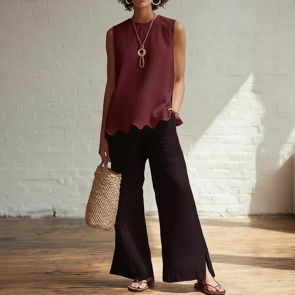 Crew-neck Sleeveless Shirt With A Wave Hem
